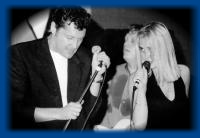 Barry Hay and Anouk performing together